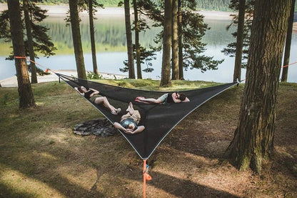Spacious multi-person hammock with 3-point suspension system, ideal for outdoor adventures and backyard relaxation.
