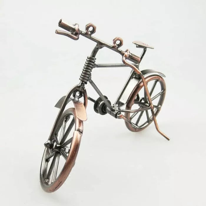 Bronze electroplated bicycle model ornament with abstract design