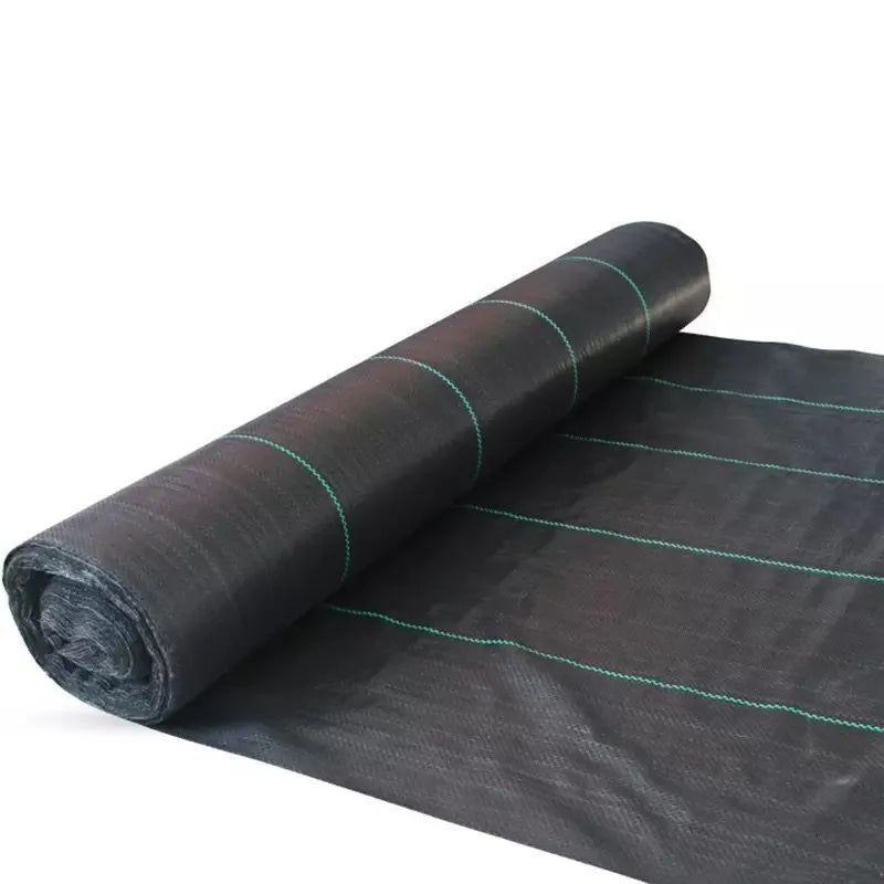 Black composite woven PE weed prevention cloth laid flat on soil.