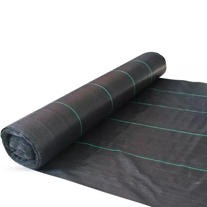 Black composite woven PE weed prevention cloth laid flat on soil.