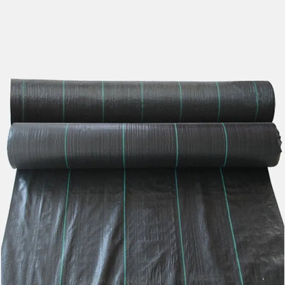 Black composite woven PE weed prevention cloth laid flat on soil.