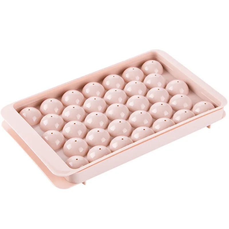 3D round ice moulds in sky blue or pink colours showing 18 and 33 grid options
