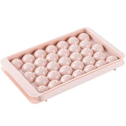3D round ice moulds in sky blue or pink colours showing 18 and 33 grid options