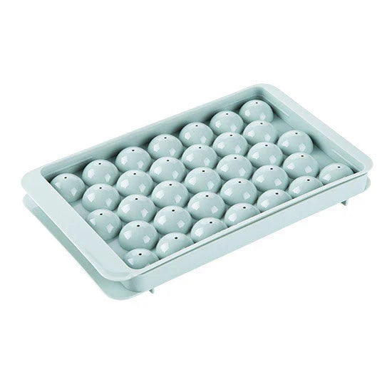 Premium 3D round ice cube trays in pink and green colors for chilling drinks and making frozen treats
