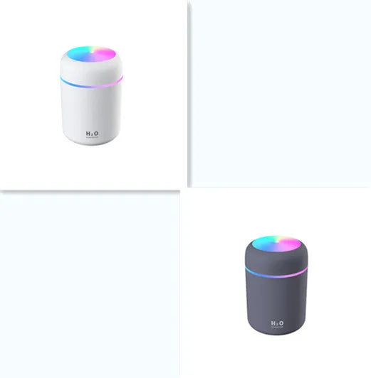 Pink car air purifying humidifier with LED lights on, next to a USB cable.