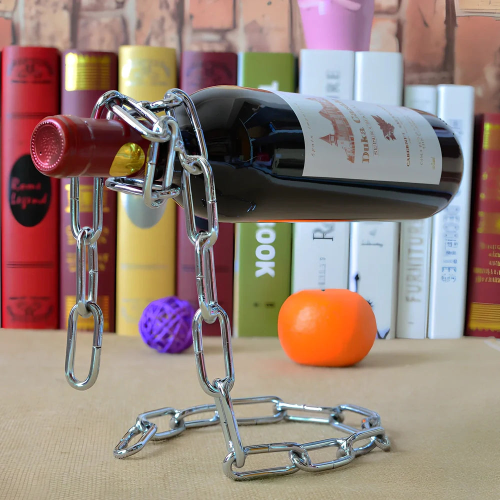 Golden chain wine shelf with European scrollwork hanging from ceiling, displaying three wine bottles
