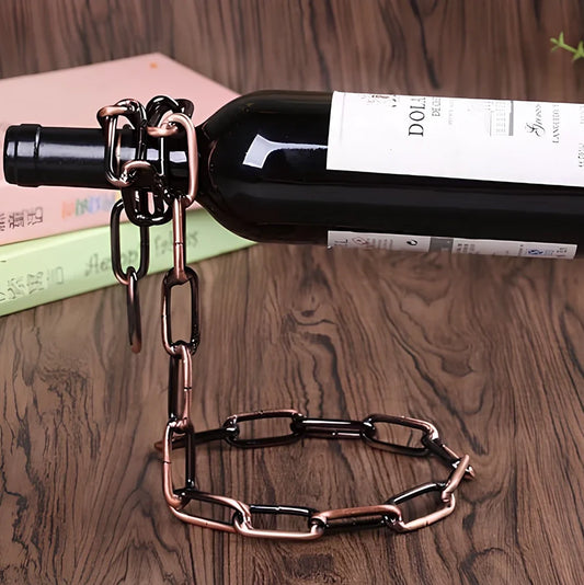 Golden chain wine shelf with European scrollwork hanging from ceiling, displaying three wine bottles