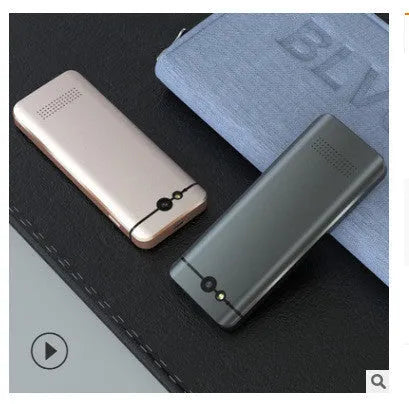 M9 Translator device in gold or silver grey with compact plastic design for group chat and photo translation
