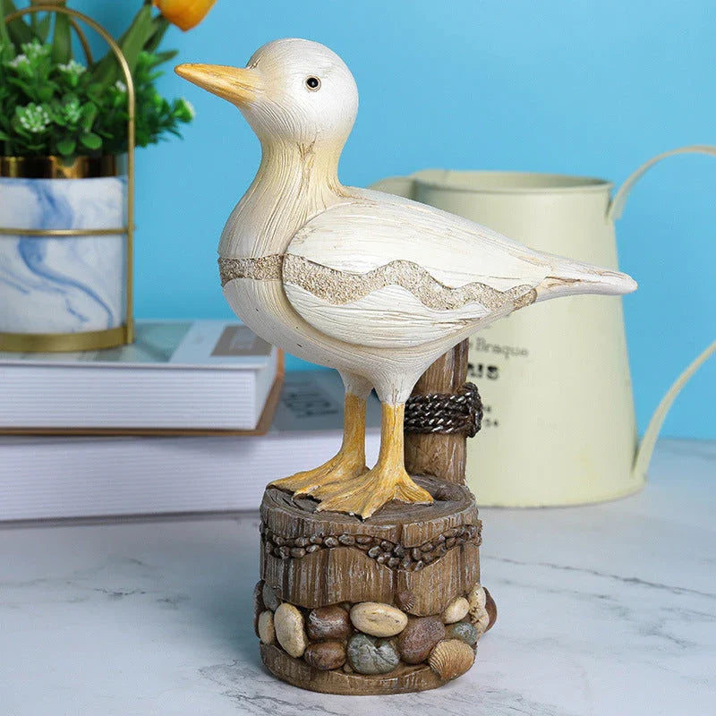 Realistic resin seagull statue with wooden stump base, perfect for coastal-inspired home decor