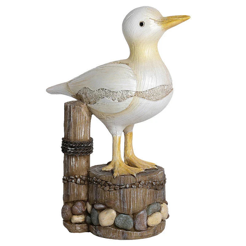 Realistic resin seagull statue with wooden stump base, perfect for coastal-inspired home decor