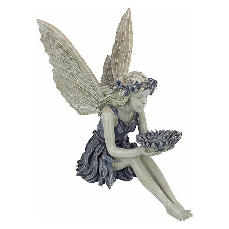 A charming resin fairy statue holding a sunflower bowl, with a flower crown and petal-inspired skirt, designed for outdoor garden decor