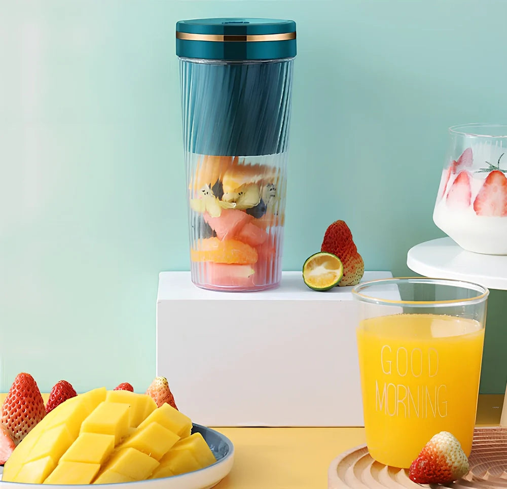 Green portable fruit juicer with 350ml capacity cup and 600ml pulp residue box