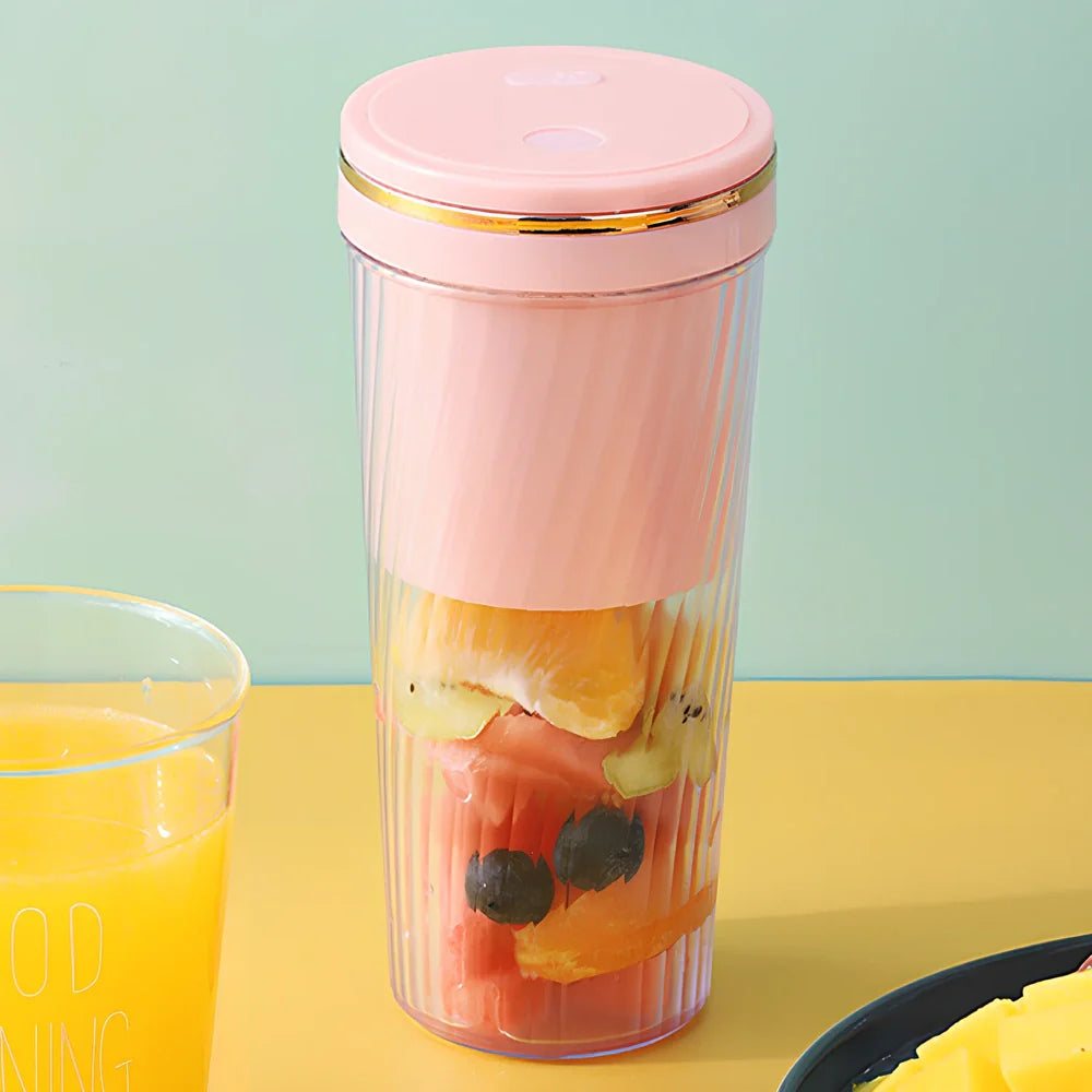 Green portable fruit juicer with 350ml capacity cup and 600ml pulp residue box