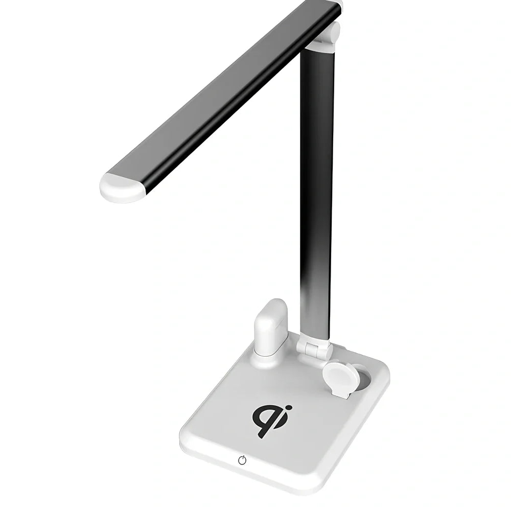 Black wireless charging desk lamp with 10W LED lighting and touch controls on wooden desk