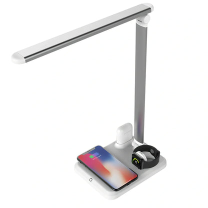 Black wireless charging desk lamp with 10W LED lighting and touch controls on wooden desk