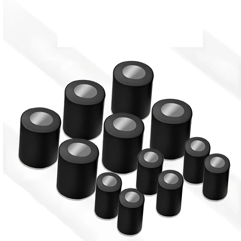 Black magnetic make-up brush drying rack with 12 silicone caps on desktop