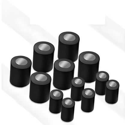 Black magnetic make-up brush drying rack with 12 silicone caps on desktop