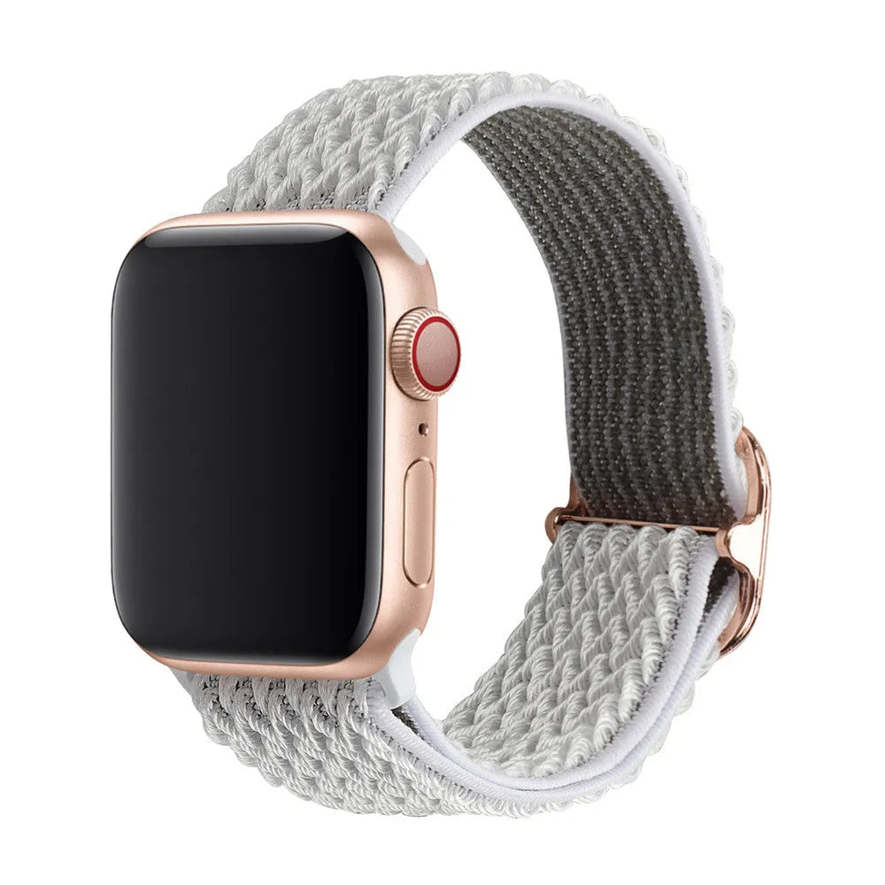 Braided nylon Apple Watch strap with wave pattern in multiple colours showing adjustable elastic construction