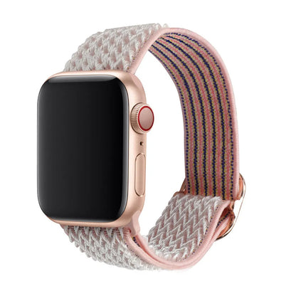 Braided nylon Apple Watch strap with wave pattern in multiple colours showing adjustable elastic construction