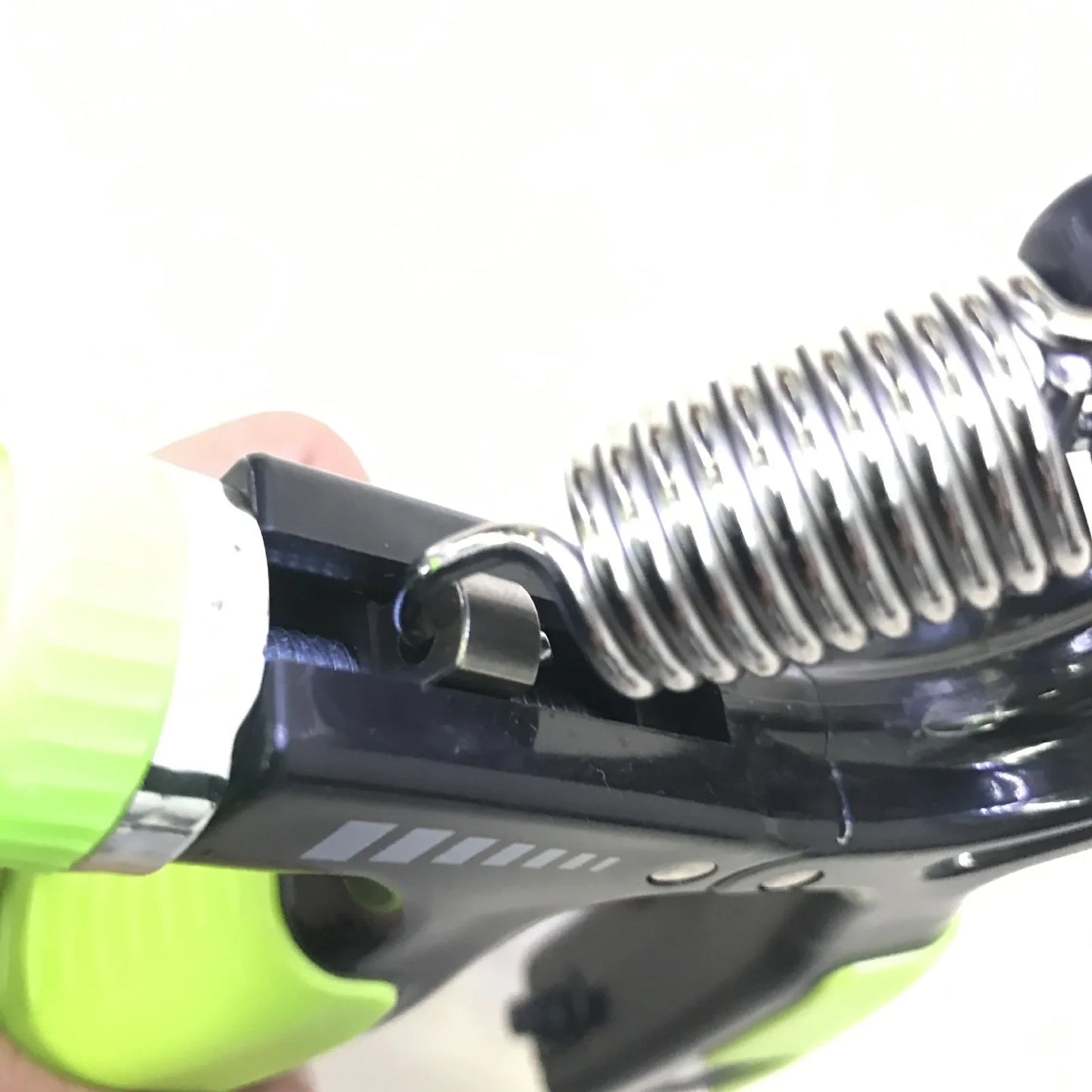 Adjustable hand gripper with digital display showing repetition count and resistance dial