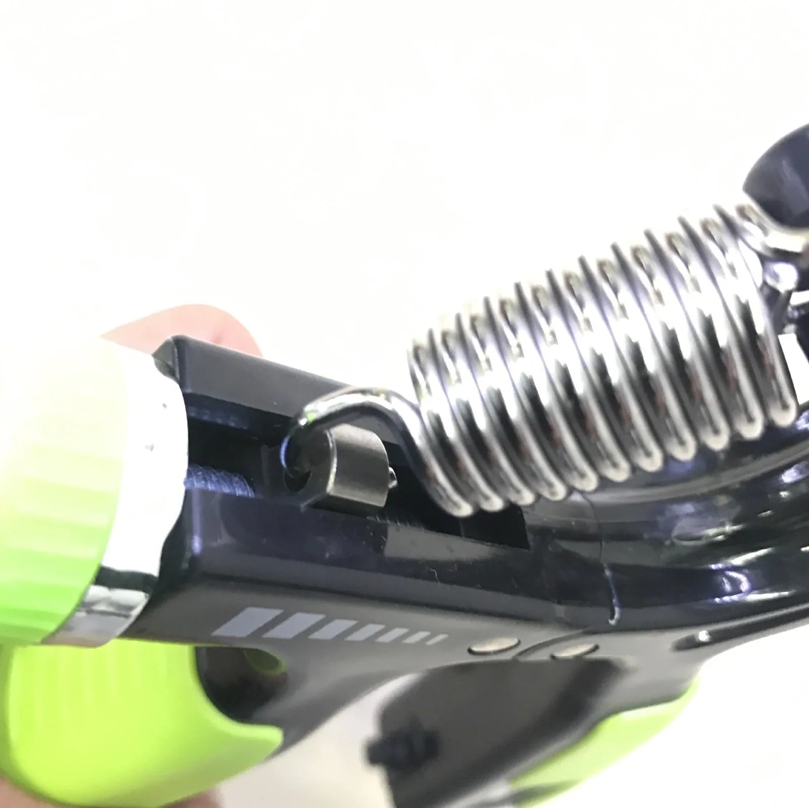 Adjustable hand gripper with digital display showing repetition count and resistance dial