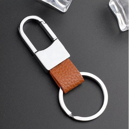 Heart-shaped leather and metal keychain in various colors