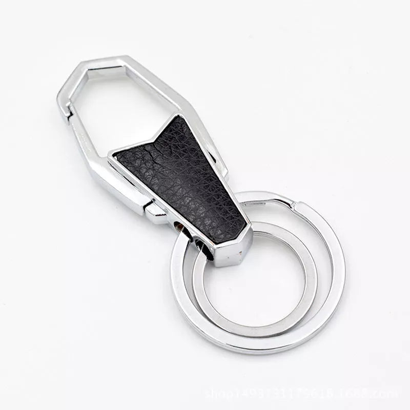 Heart-shaped leather and metal keychain in various colors