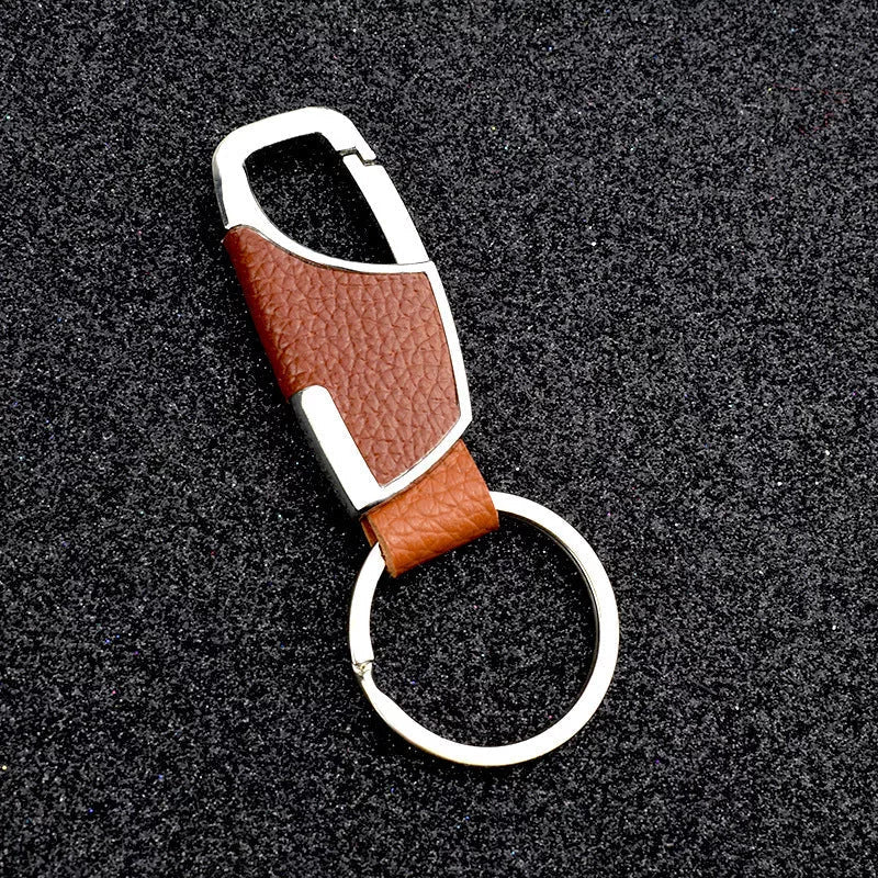 Heart-shaped leather and metal keychain in various colors