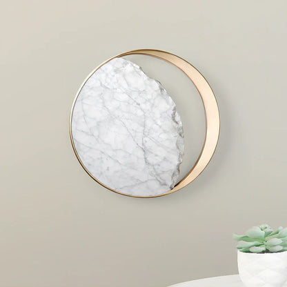 Circular marble wall lamp with copper accents, 25cm diameter, mounted beside bed