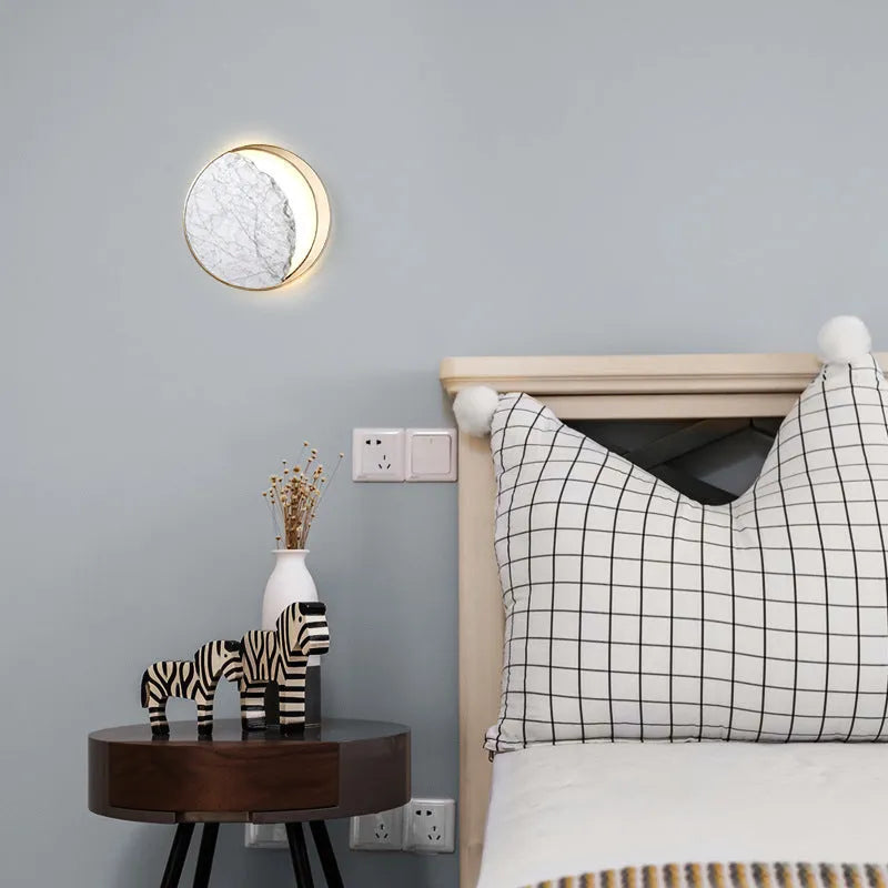 Round marble wall lamp with copper eclipse design, showing 25cm diameter and 6cm thickness.