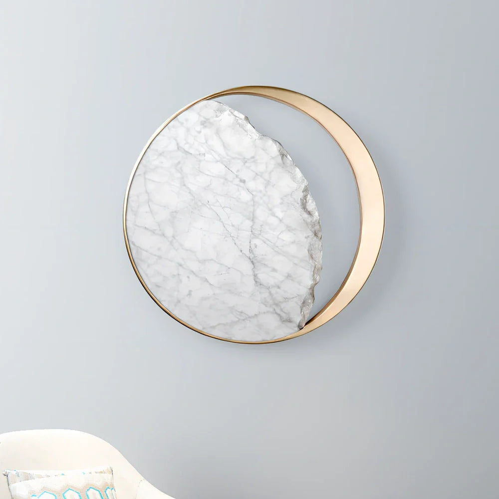 Circular marble wall lamp with copper accents, 25cm diameter, mounted beside bed