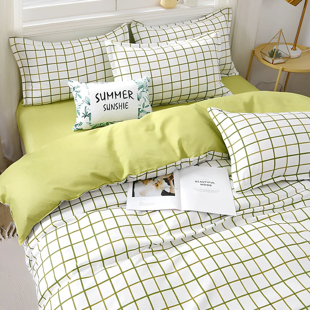 Aloe-infused duvet cover set with botanical patterns in four colours, showing precise UK sizing from 1.2m to 2.2m beds