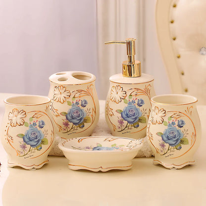Five-piece ceramic bathroom set with ivory porcelain finish and hand-painted gold detailing