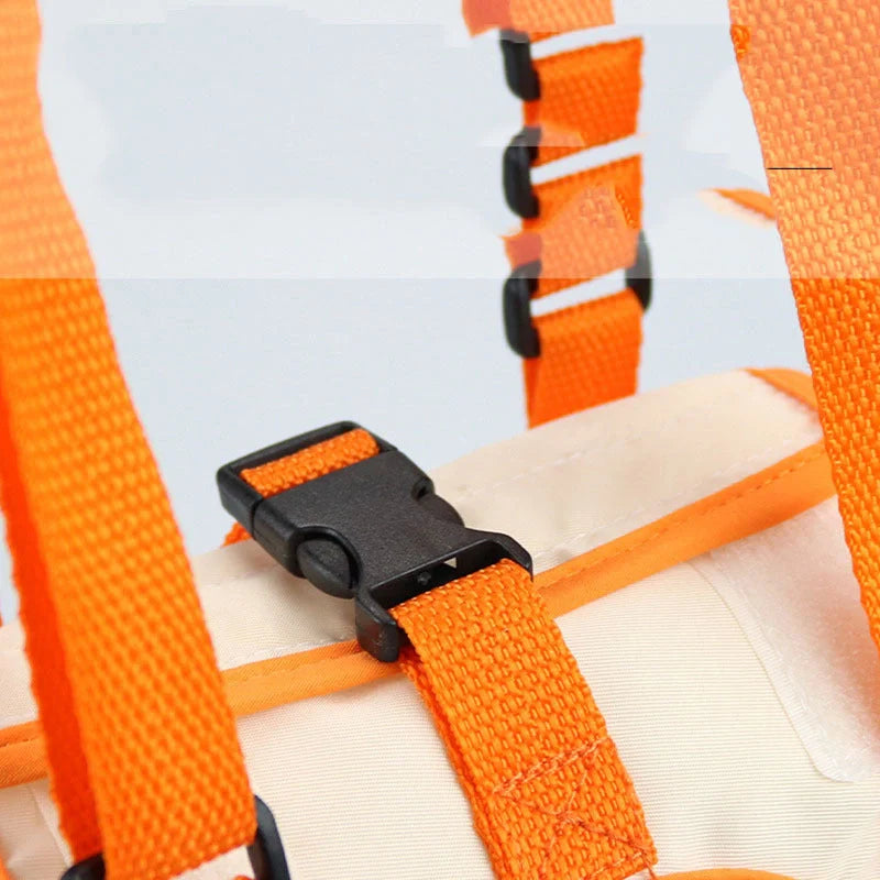 Adjustable dog lift harness in orange, supporting hind legs with breathable mesh