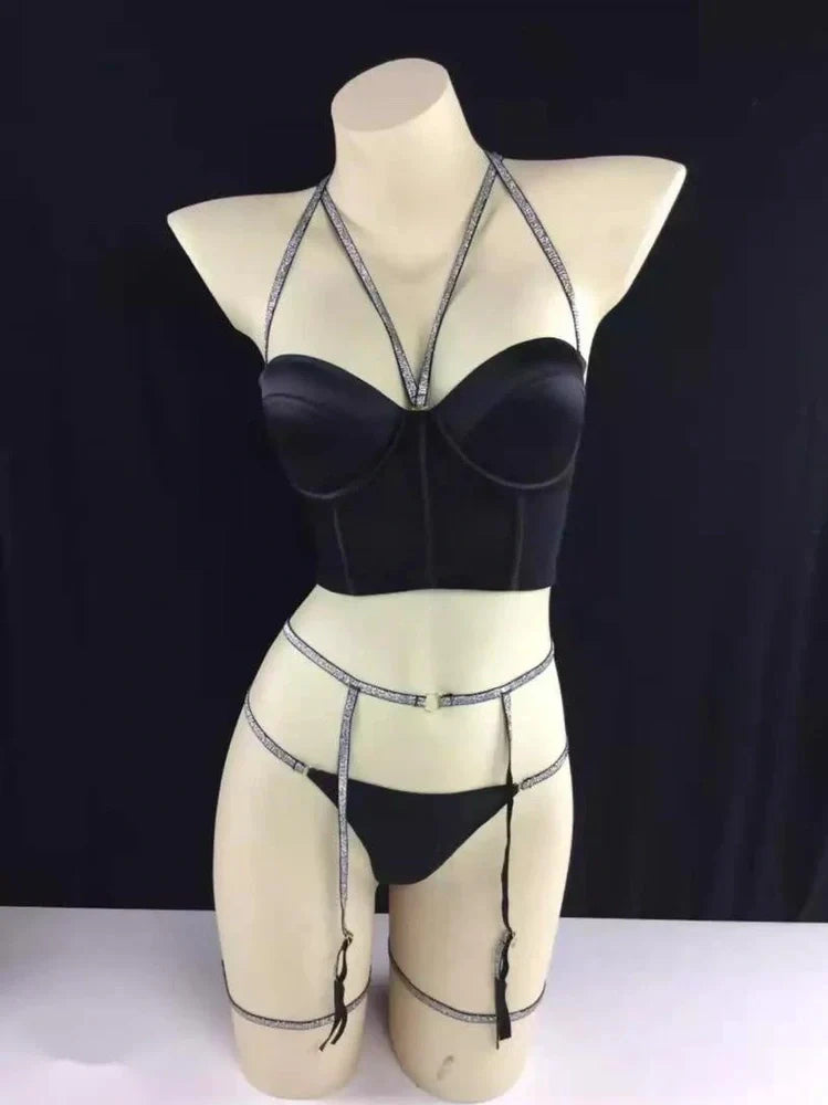 White three-point lingerie garter set with adjustable straps and reinforced stitching