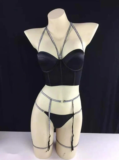 White three-point lingerie garter set with adjustable straps and reinforced stitching