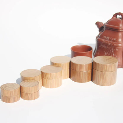 Handmade bamboo cosmetics bottle with hand-polished surface and natural grain texture