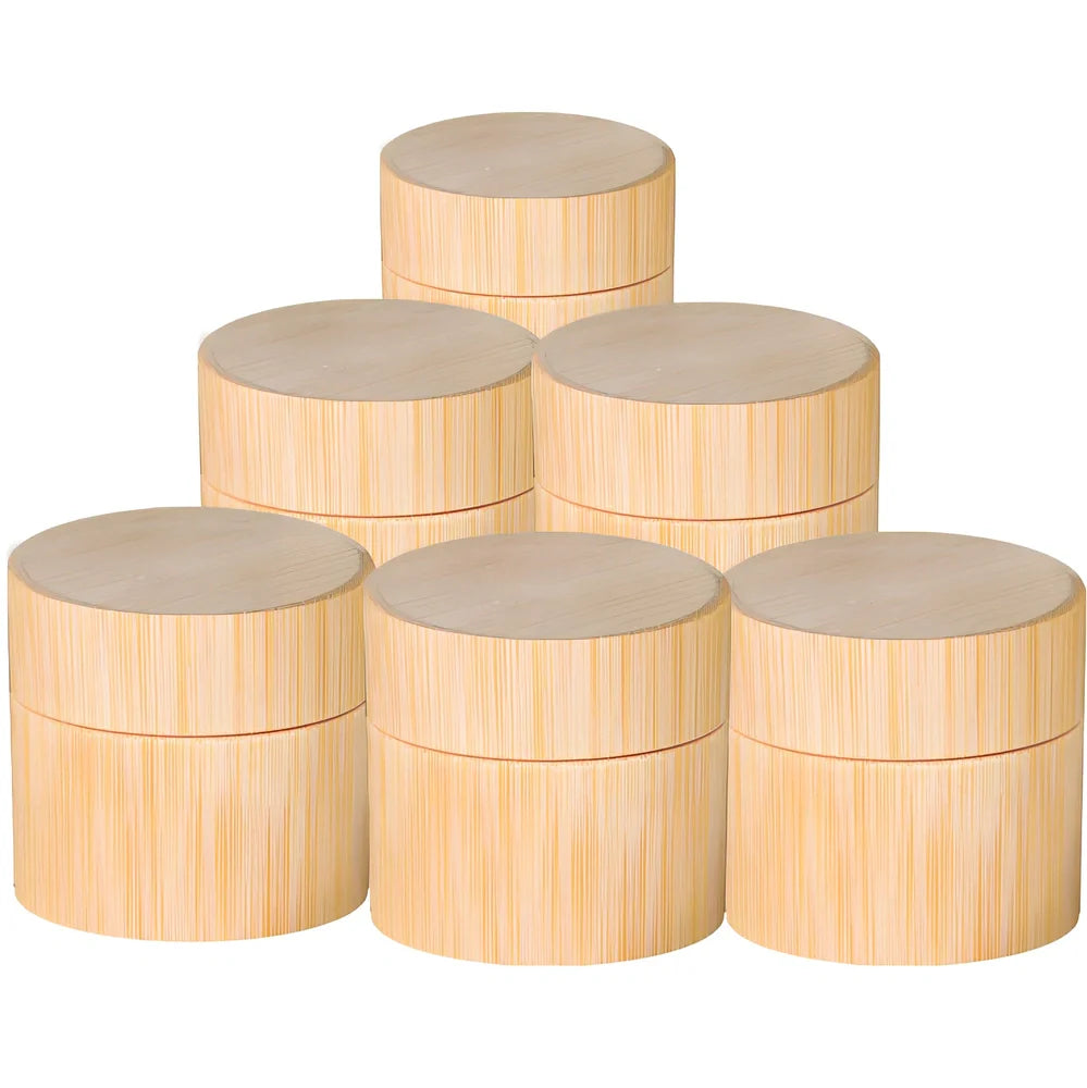 Handmade bamboo cosmetics bottle with hand-polished surface and natural grain texture