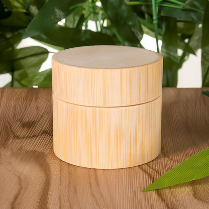 Handmade bamboo cosmetics bottle with hand-polished surface and natural grain texture