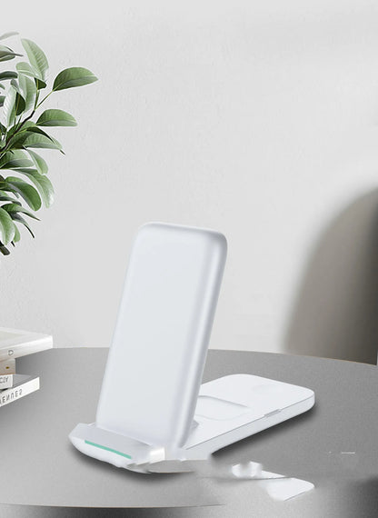 Black and white foldable three-device wireless charger showing TYPE-C port