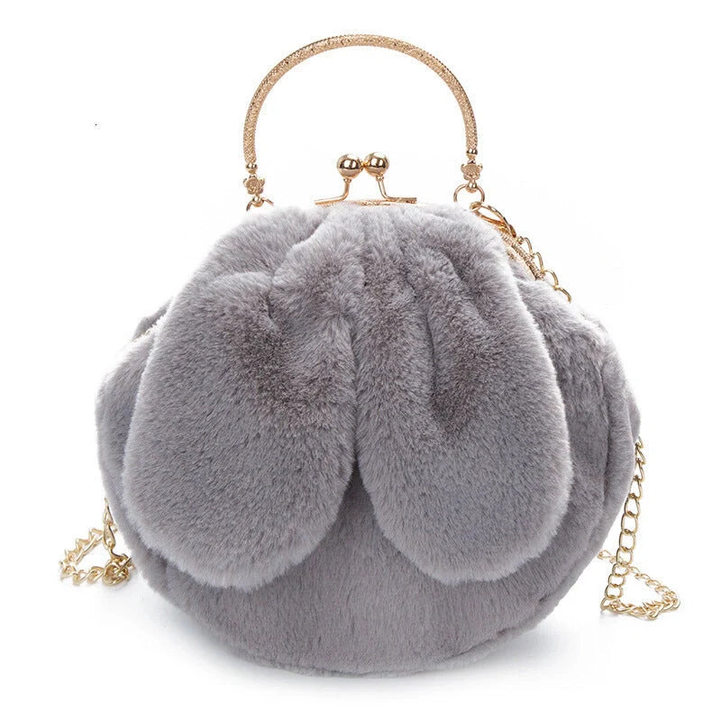 Trendy faux fur rabbit ear messenger bag in various colors including black, grey, pink, white, red, purple, and dark pink