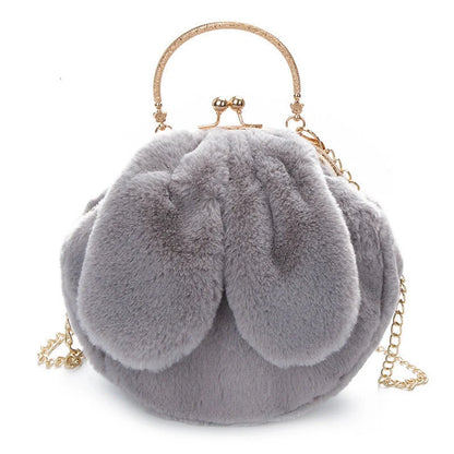Trendy faux fur rabbit ear messenger bag in various colors including black, grey, pink, white, red, purple, and dark pink