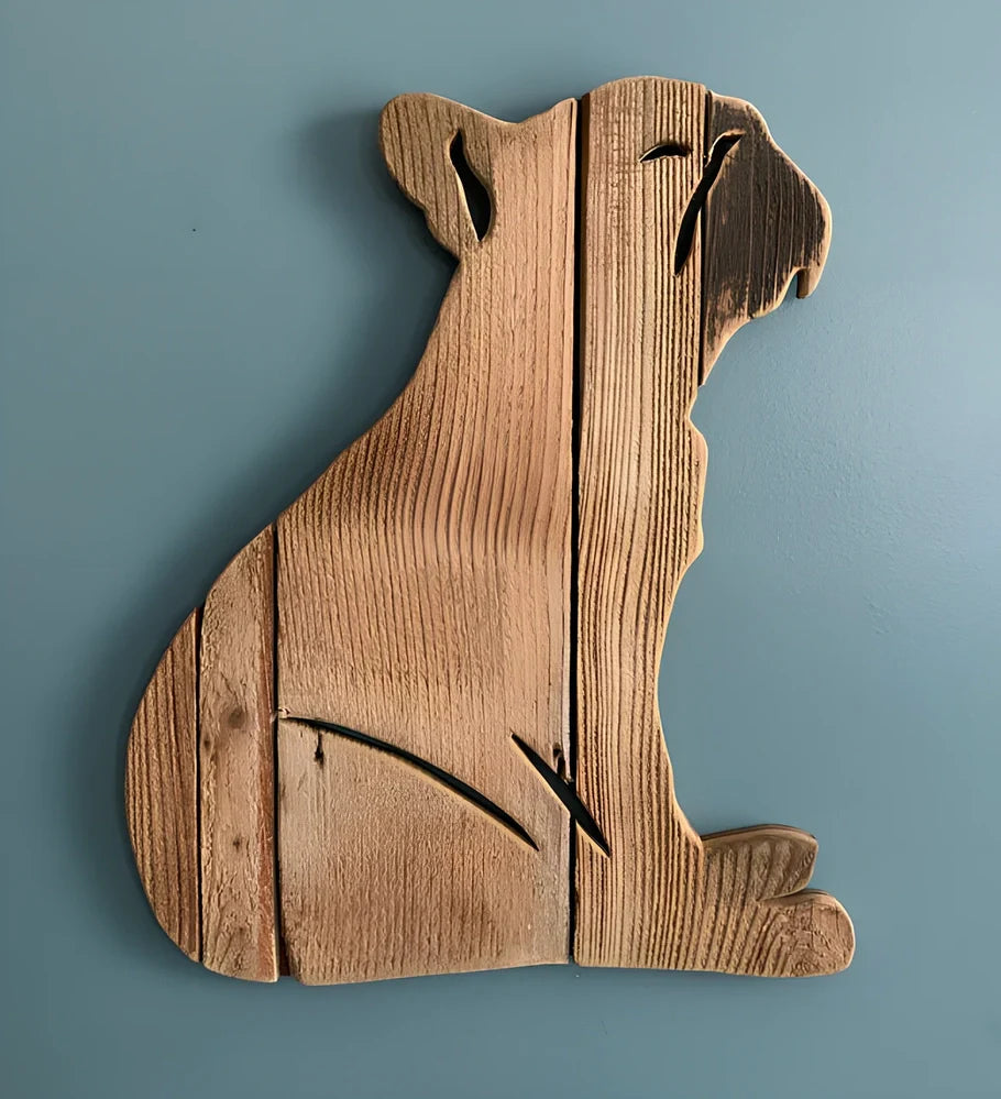 Handcrafted wooden dog breed decoration showing manual carving details on solid wood