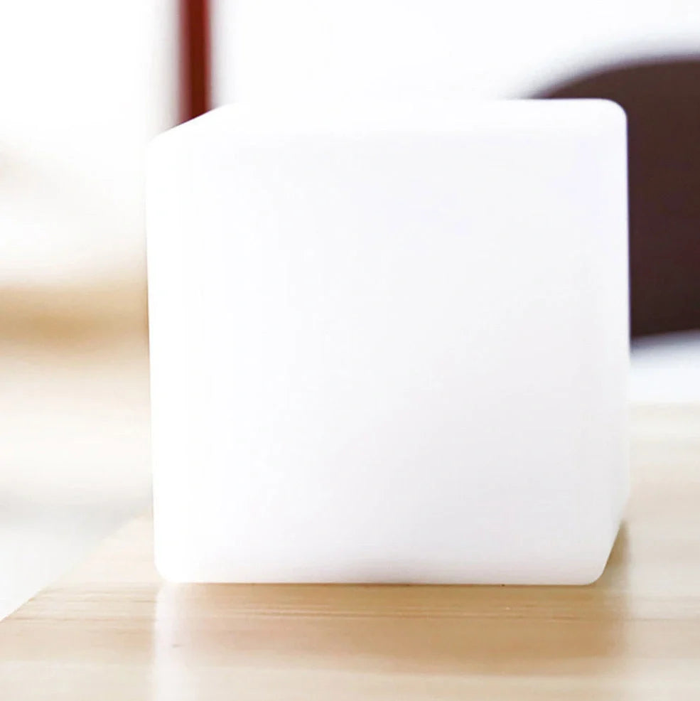 Square cube table lamp with LED lighting in modern design for restaurant atmosphere