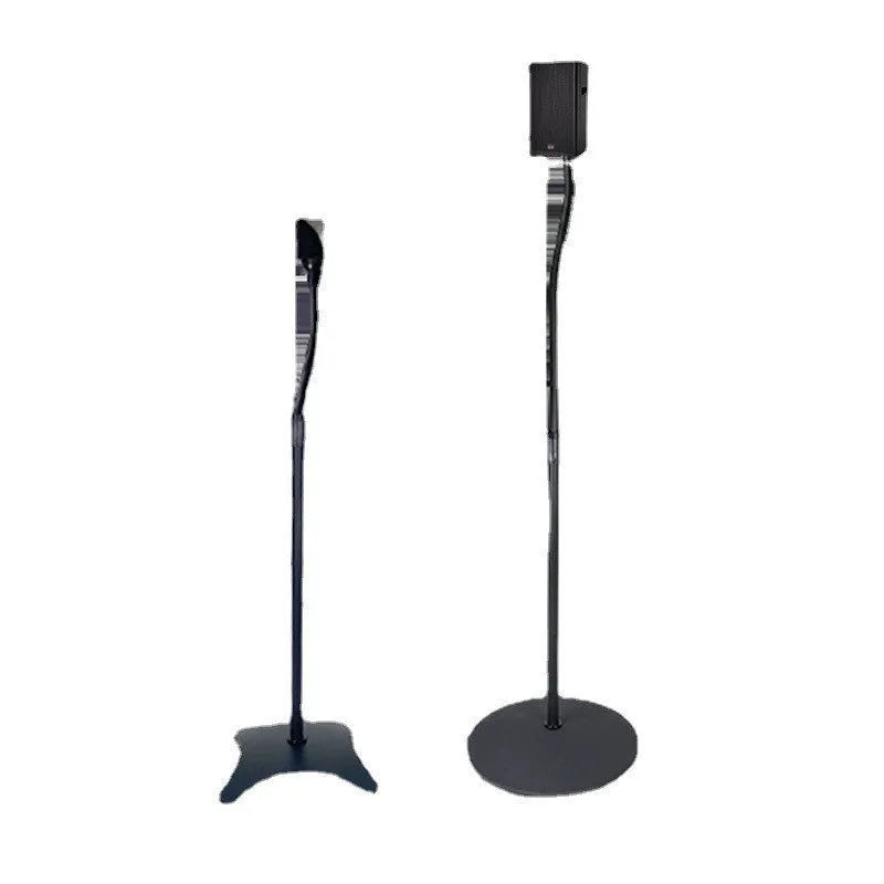 Black tripod speaker stand holding a white Apple HomePod Mini on a wooden shelf.