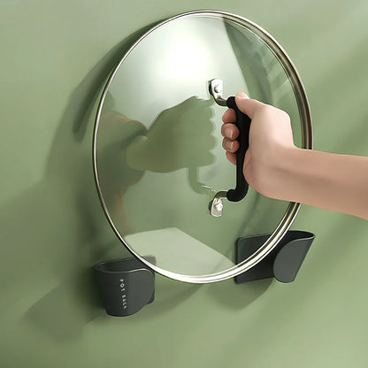 Wall-mounted pot cover storage rack with non-punching installation measuring 16.5cm wide
