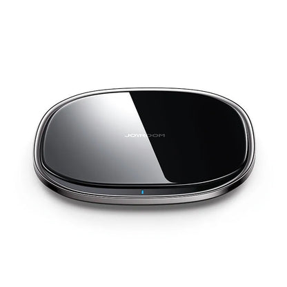 Black wireless charging pad with zinc alloy body and glass surface measuring 99.2mm square