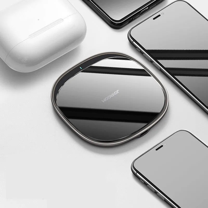 Black wireless charging pad with zinc alloy body and glass surface measuring 99.2mm square
