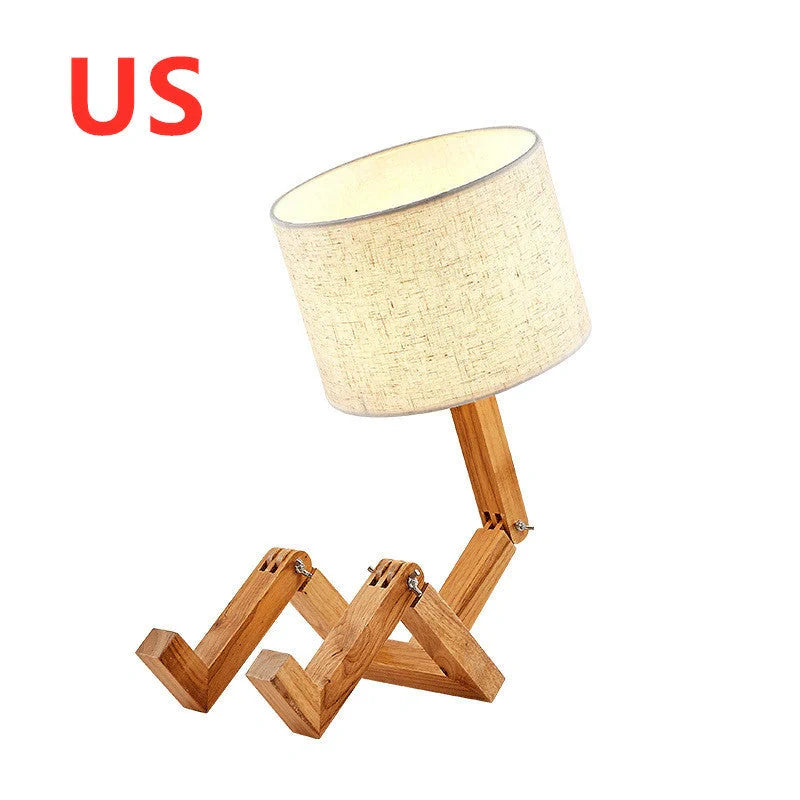 Humanoid wooden table lamp with deformable design and fabric shade for modern home decor