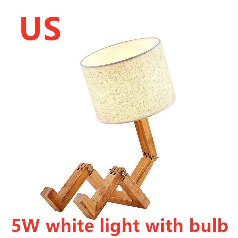 Humanoid wooden table lamp with deformable design and fabric shade for modern home decor